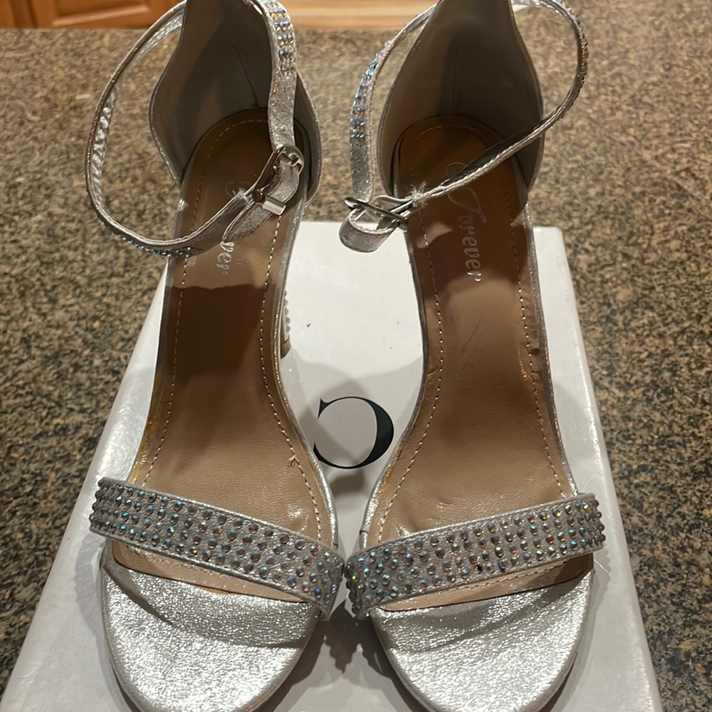 Silver sparkle heels with ankle straps, gently worn